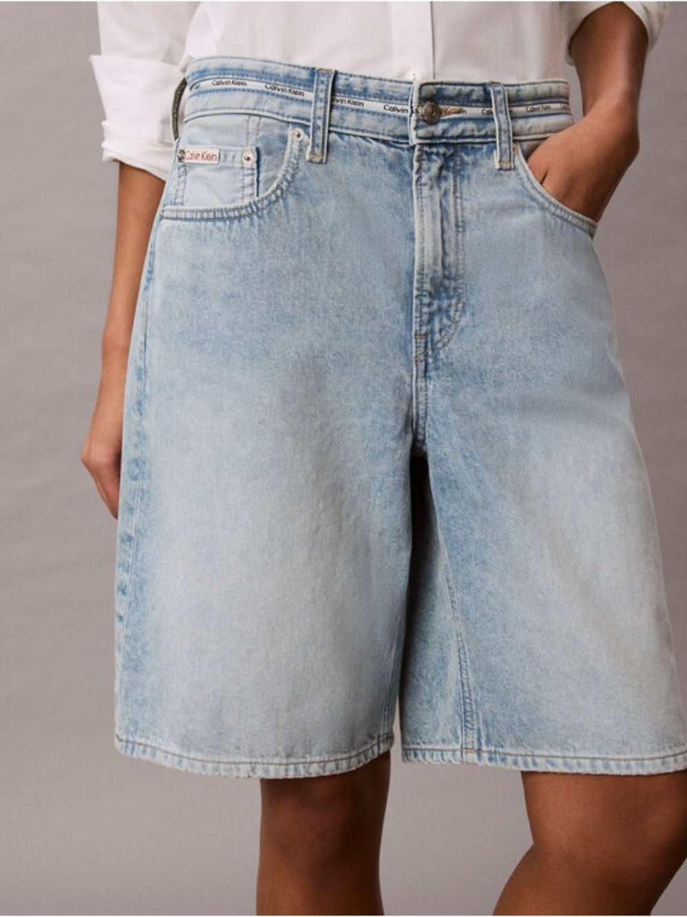 Calvin Klein Mid Rise Bermuda Short in Light Wash